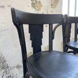 Set of 7 black bistro chairs