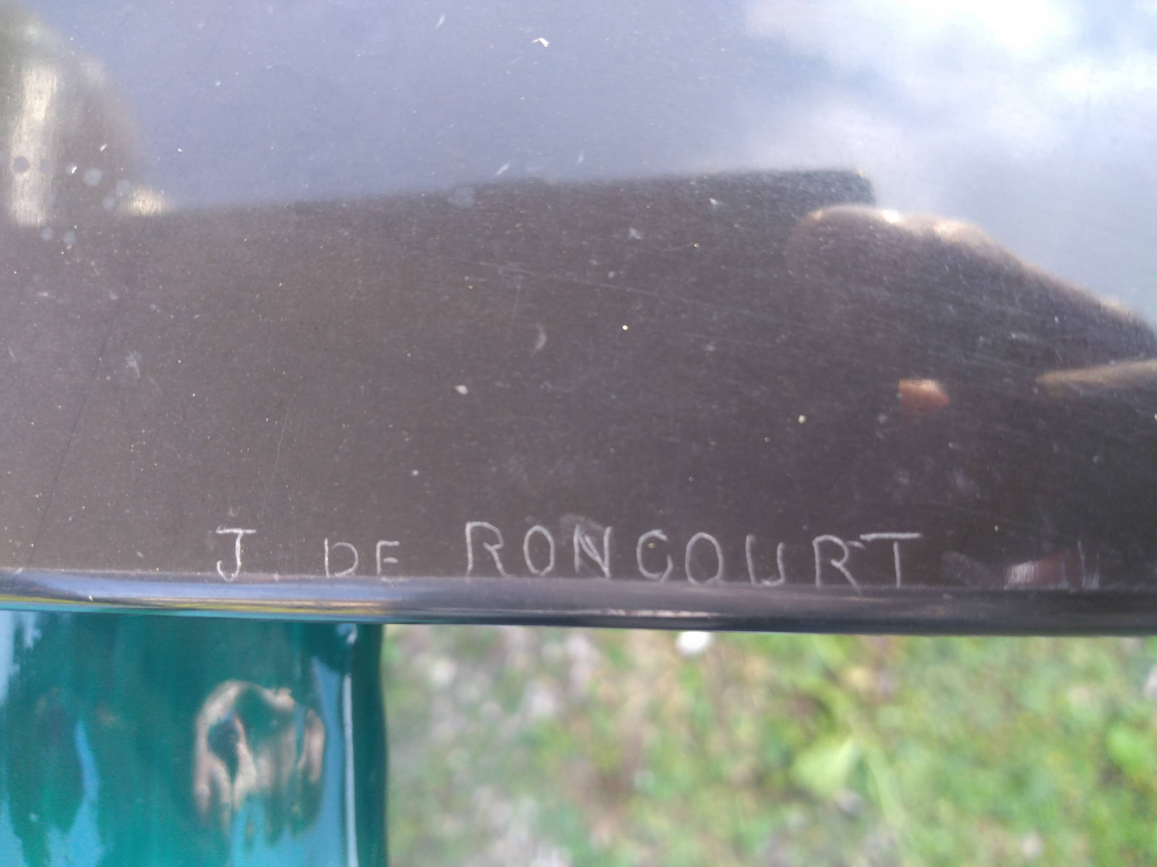 bronze sculpture athlete bending an iron bar by Jean de Roncourt on an art deco marble base