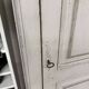 Grey patinated lacquered wooden bonnetière with moulding