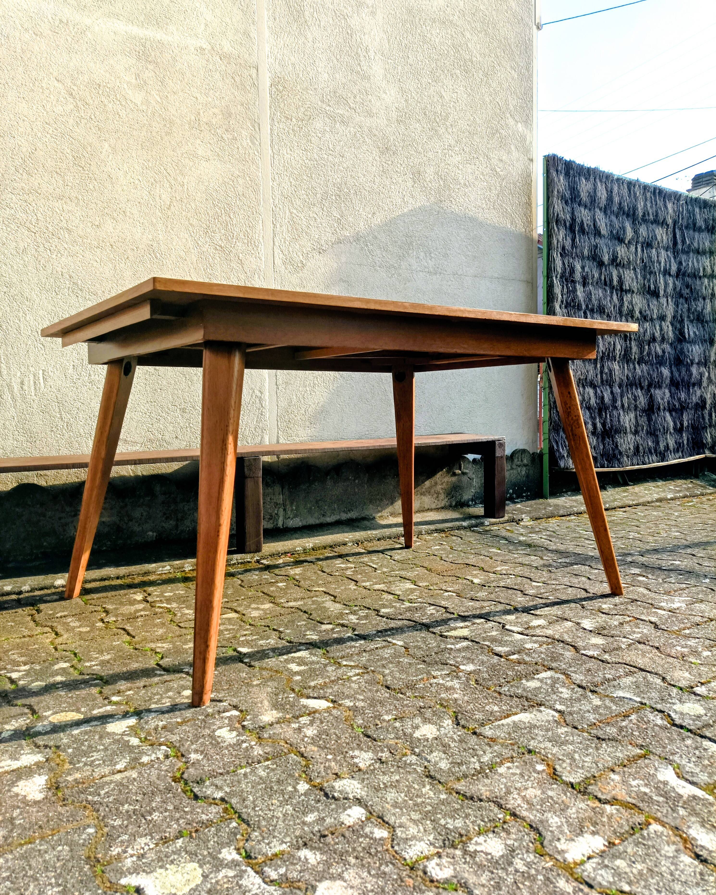 Dining table with tapered legs