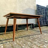 Dining table with tapered legs