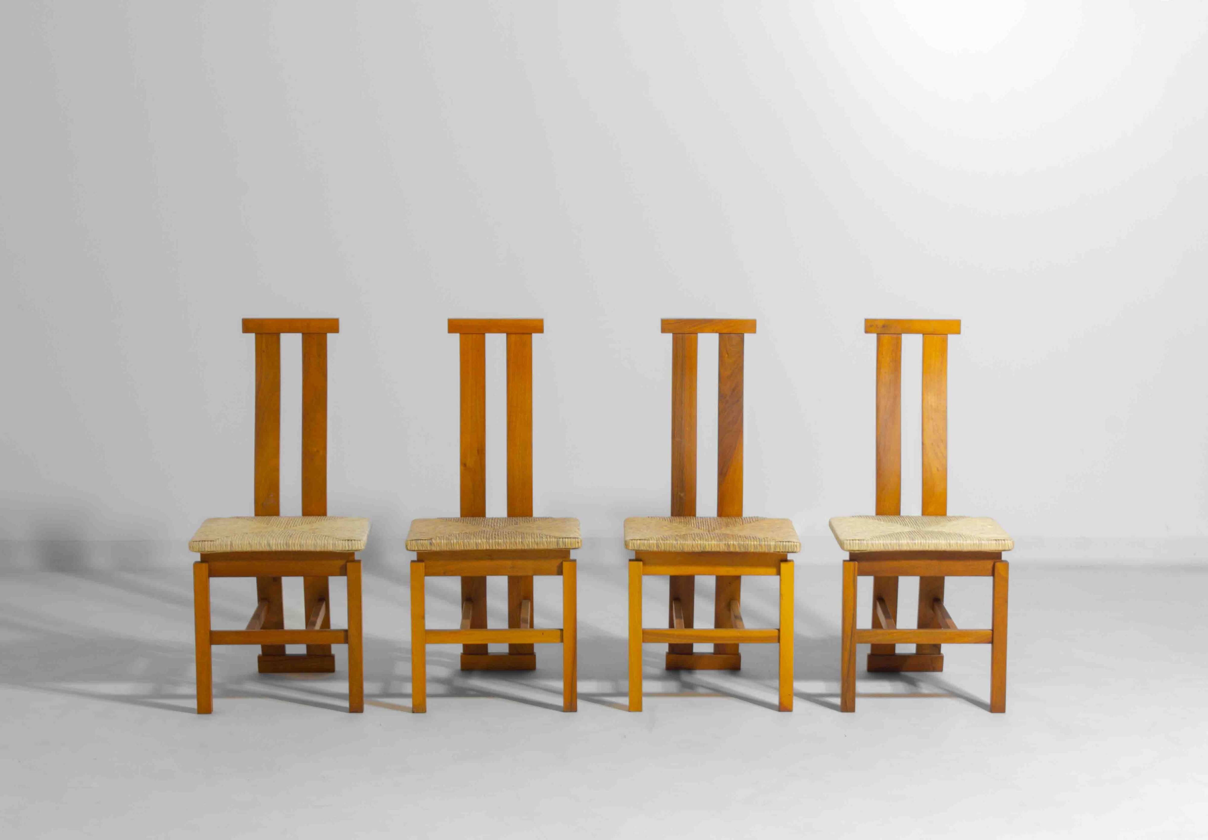 Sculptural postmodern dining chairs in wood with curved back, 1980s