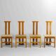 Sculptural postmodern dining chairs in wood with curved back, 1980s