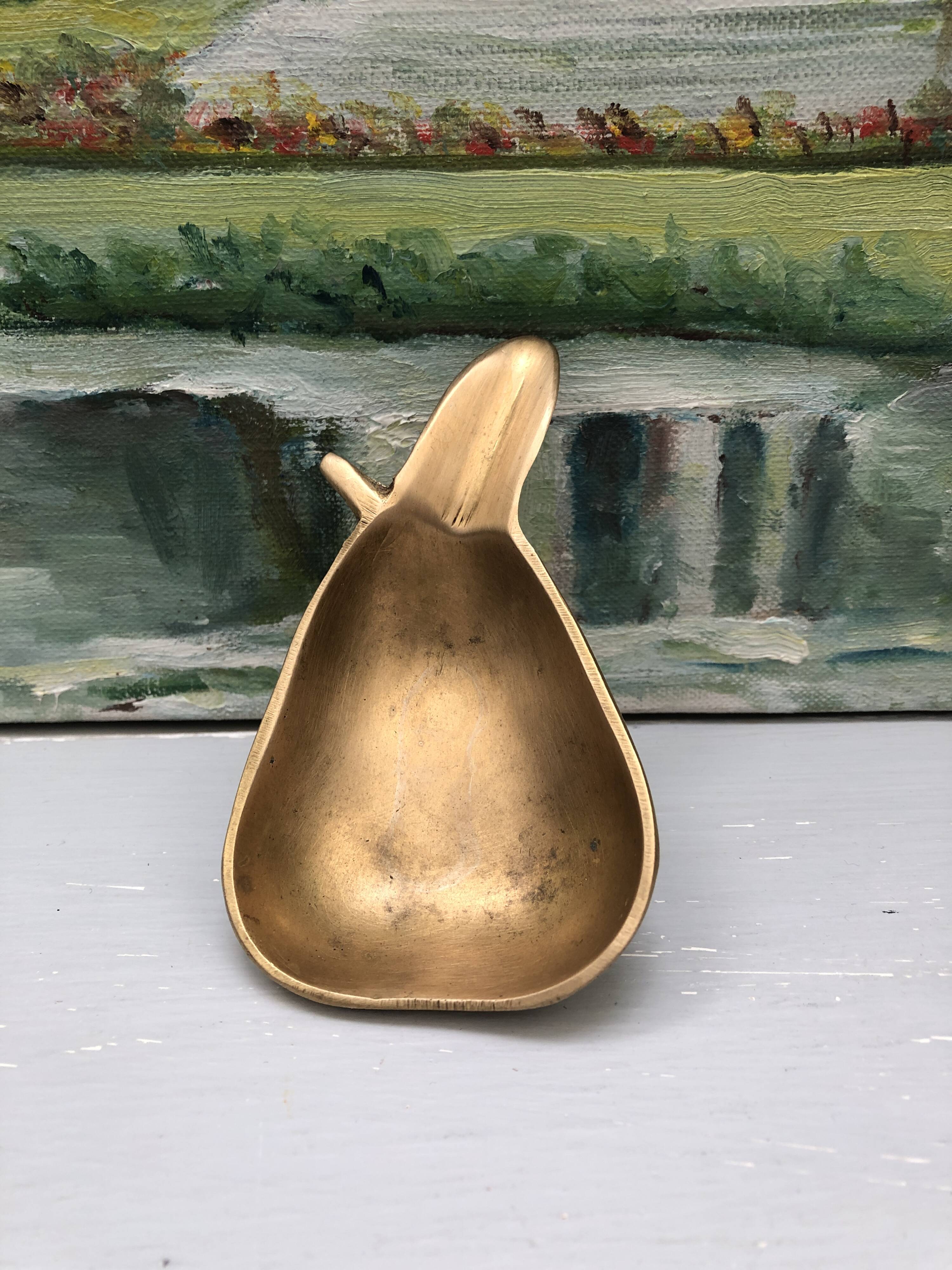 Vintage brass ashtray in the shape of a fruit, pear