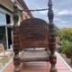 Pair of traditional Indian antique chairs in carved wood.