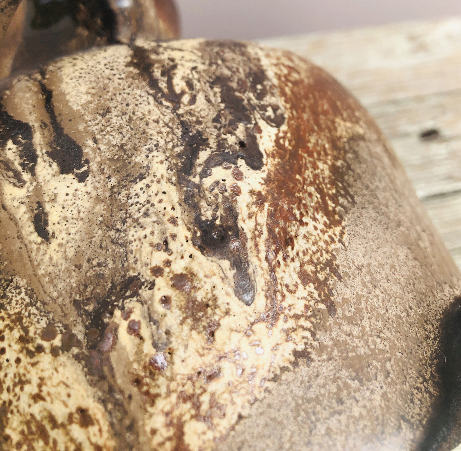 Ancient sided jug in flamed sandstone