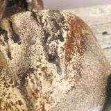 Ancient sided jug in flamed sandstone