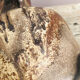 Ancient sided jug in flamed sandstone