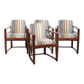Ensemble de 4 chaises de salle à manger au design Art Déco avec un revêtement en tissu luxueux.