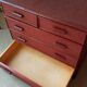 Vintage red lacquered rattan chest of drawers