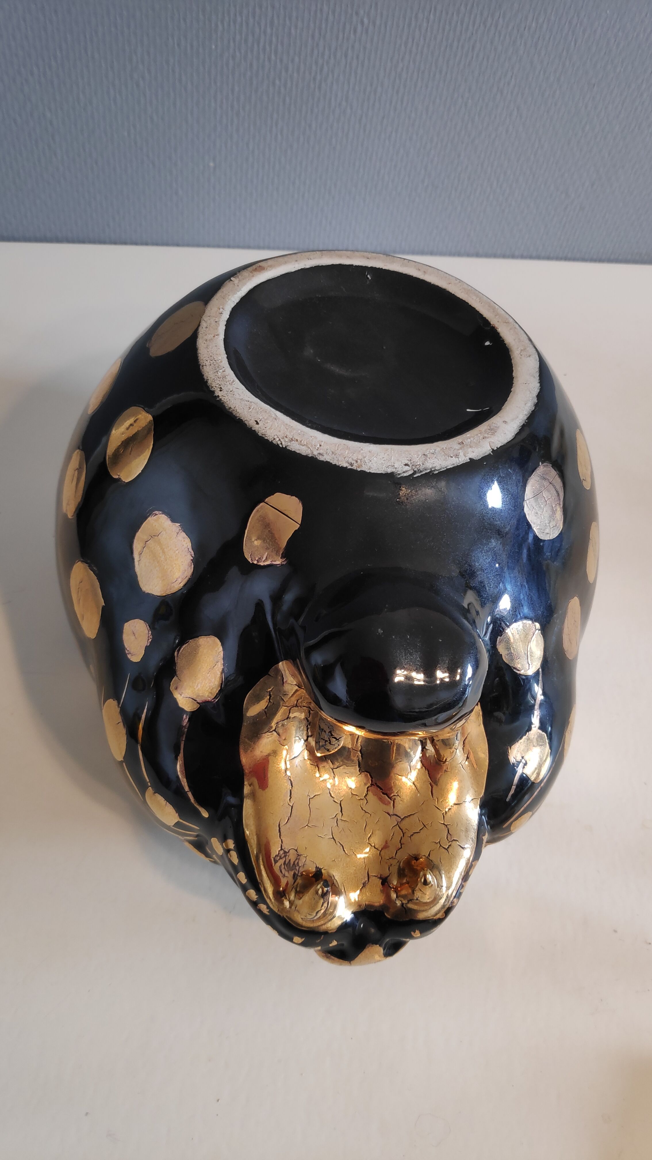 black and gold ceramic panther pot cache