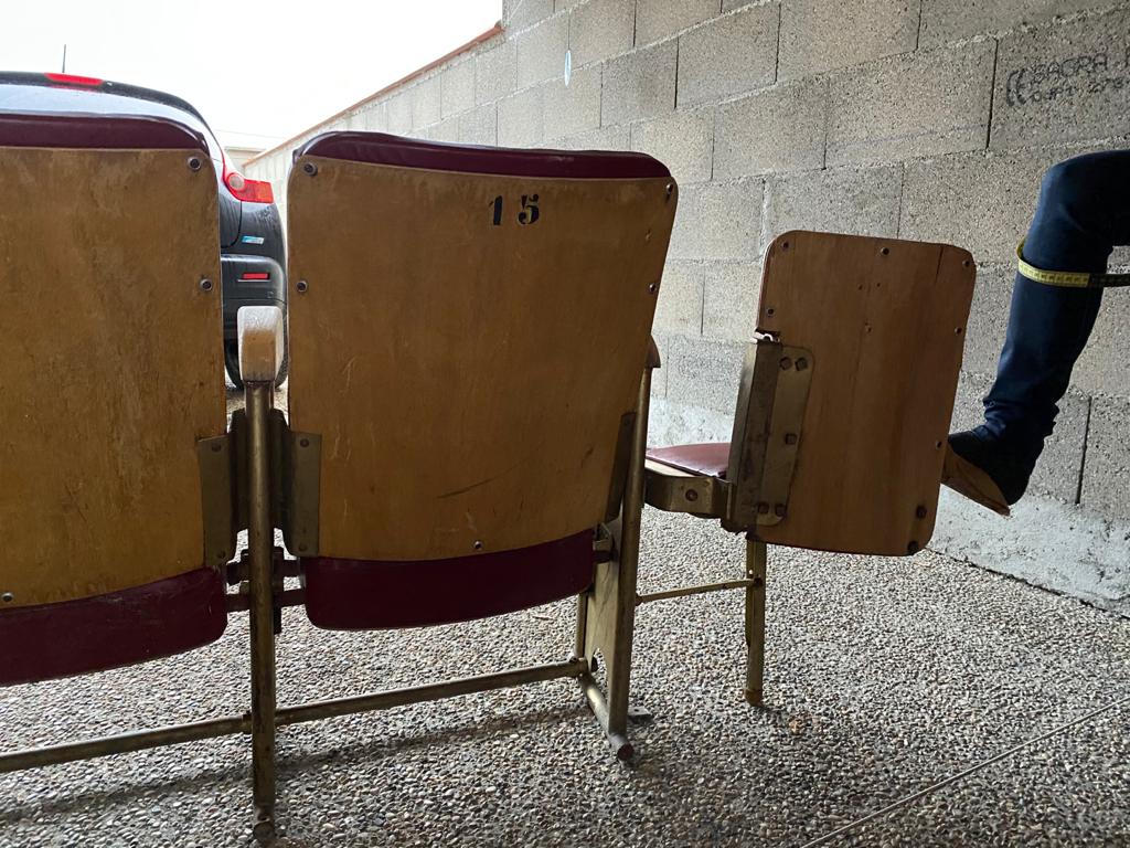 Old cinema armchair bench