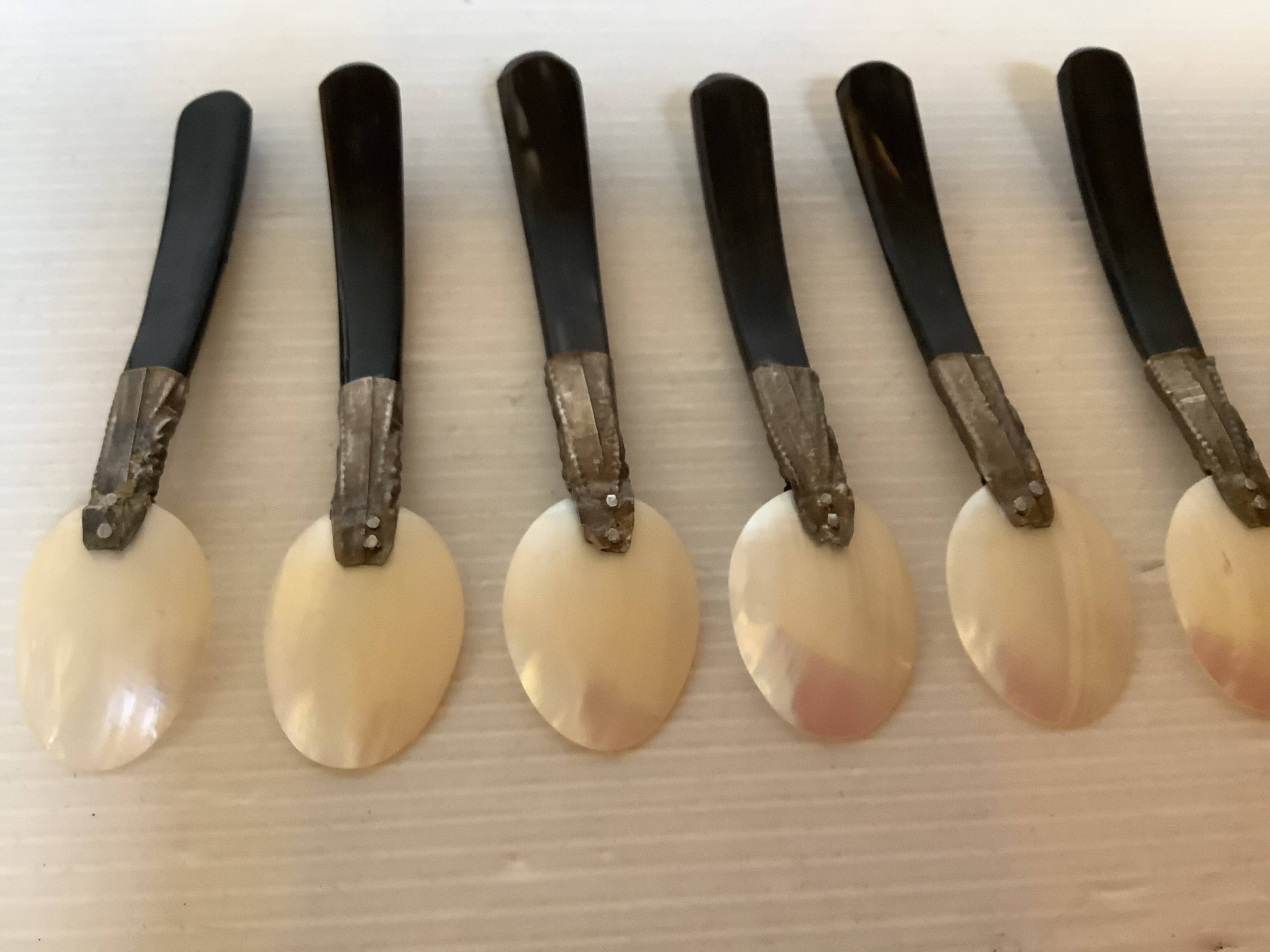 Six antique mother-of-pearl caviar spoons