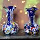 Pair of antique millefiori glass vases attributed to Murano with 2 handles.