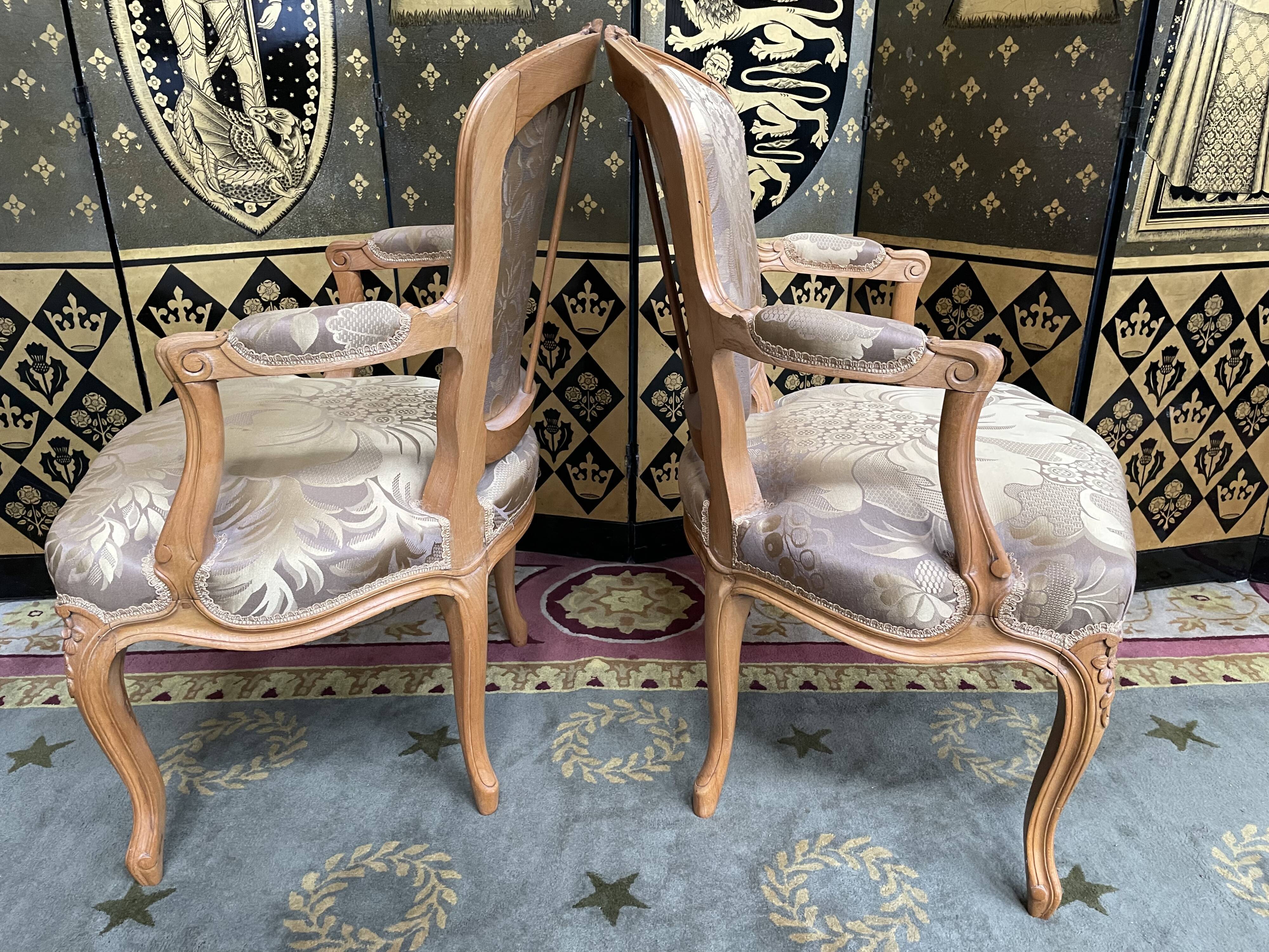 Pair of Louis XV style convertible armchairs