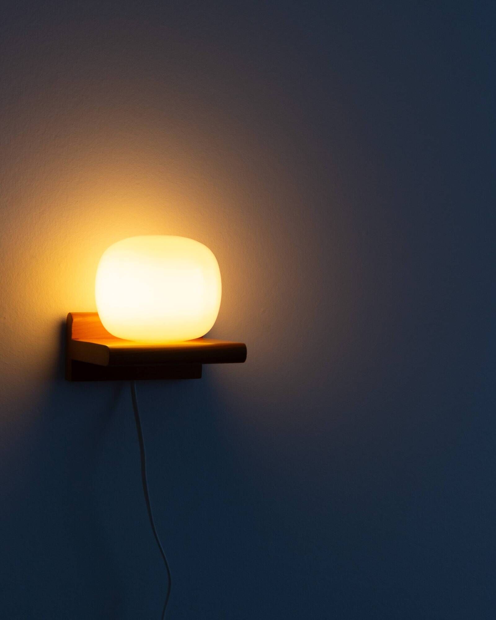 Pair of pine and opaline wall lights, 70s/80s