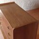 Vintage slanted commode with tapered legs from the 1960s in golden oak.
