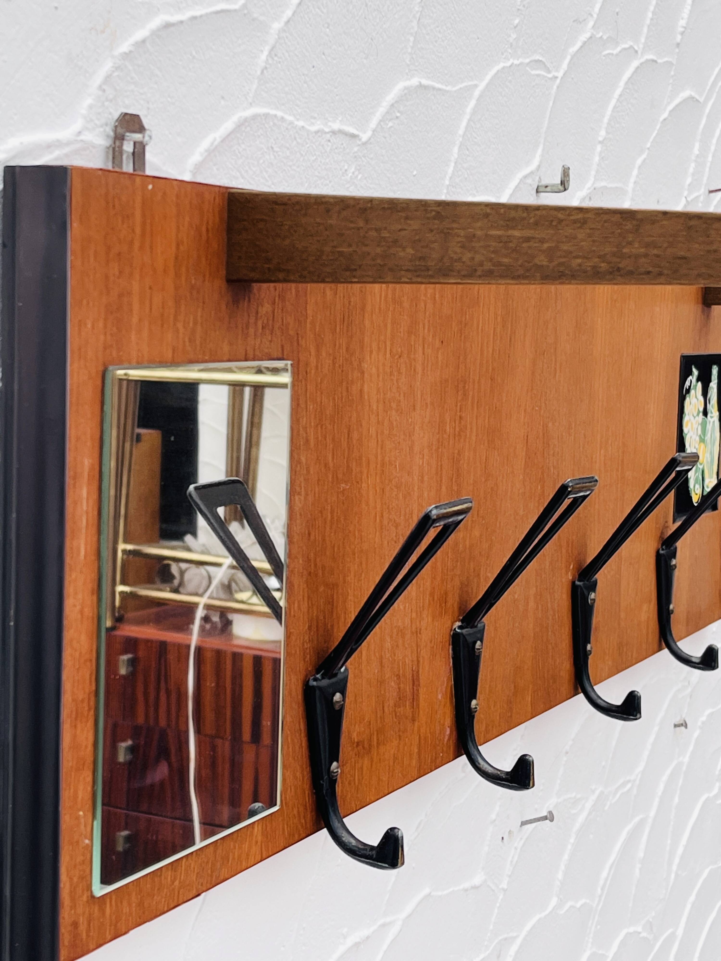Vintage wooden wall coat rack mirror from the 1960s.