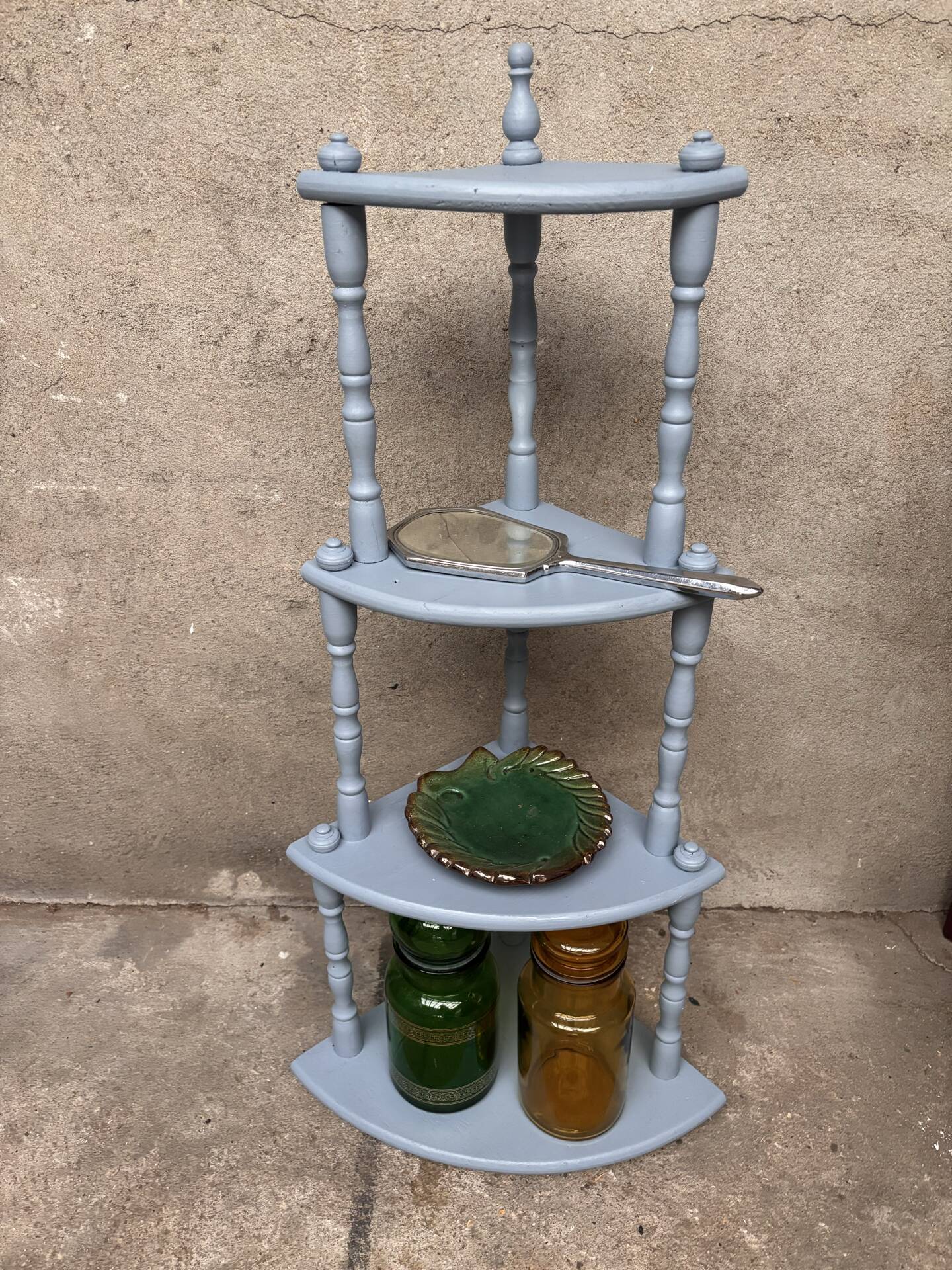Antique corner shelf on legs