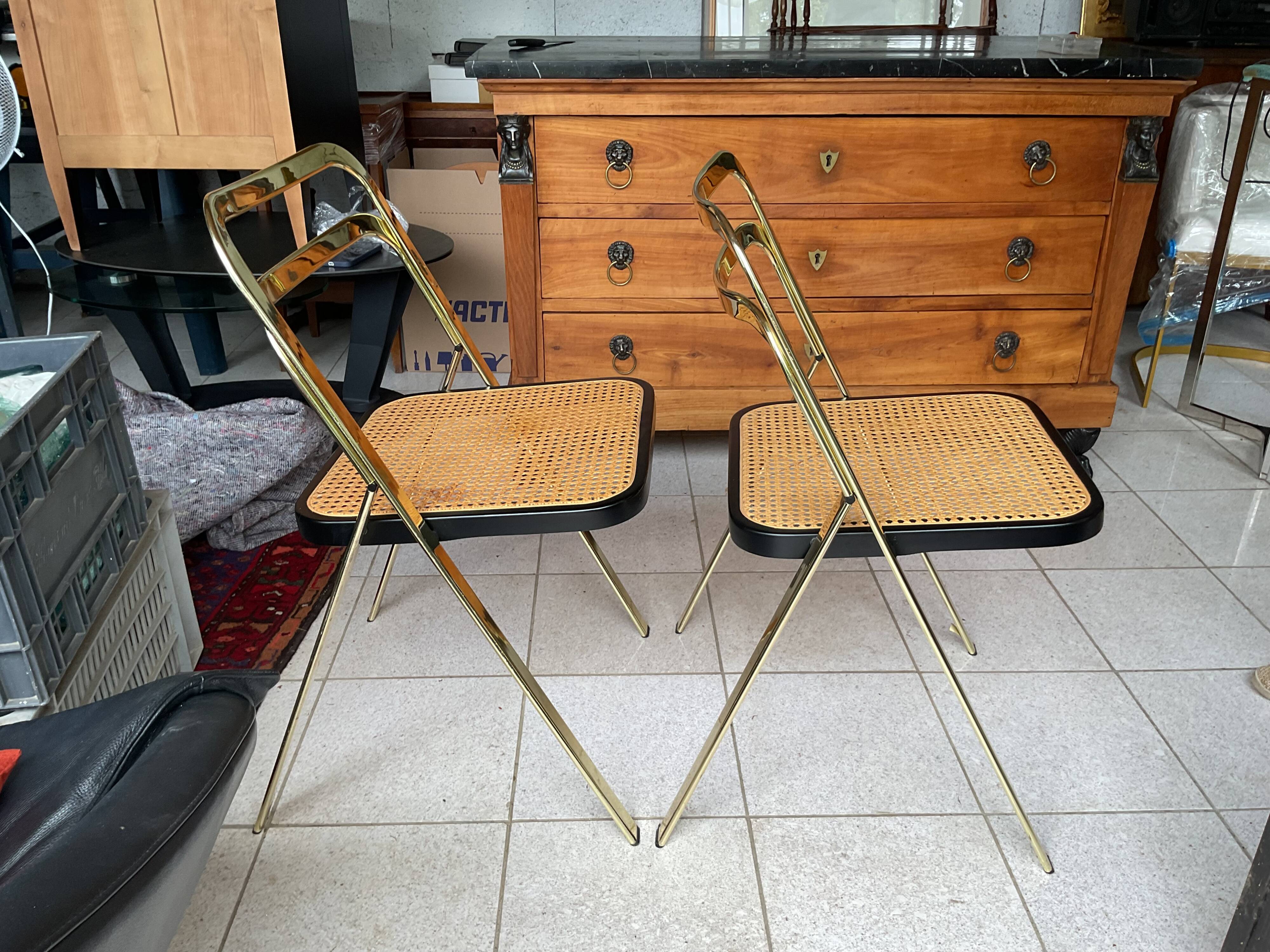 2 ribbed folding chairs CIDUE in gold chrome
