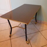 Lounge table, side table on wheels, formica top, gold and black metal