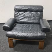Vintage black leather patchwork and oak lounge chair