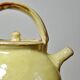 Small vintage pale yellow enamelled terracotta goat jug