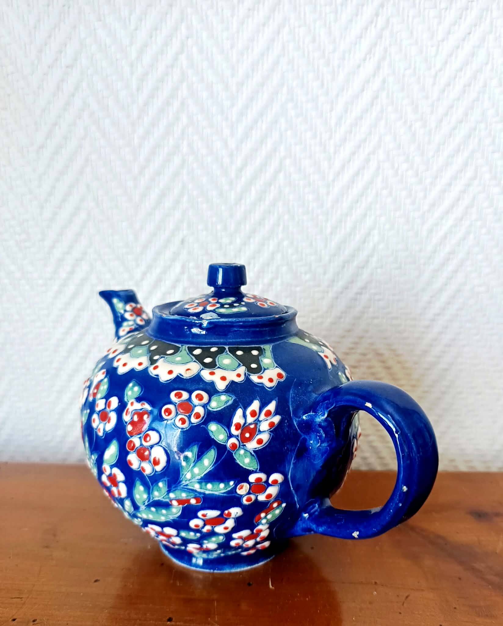 Vintage enamel ceramic teapot