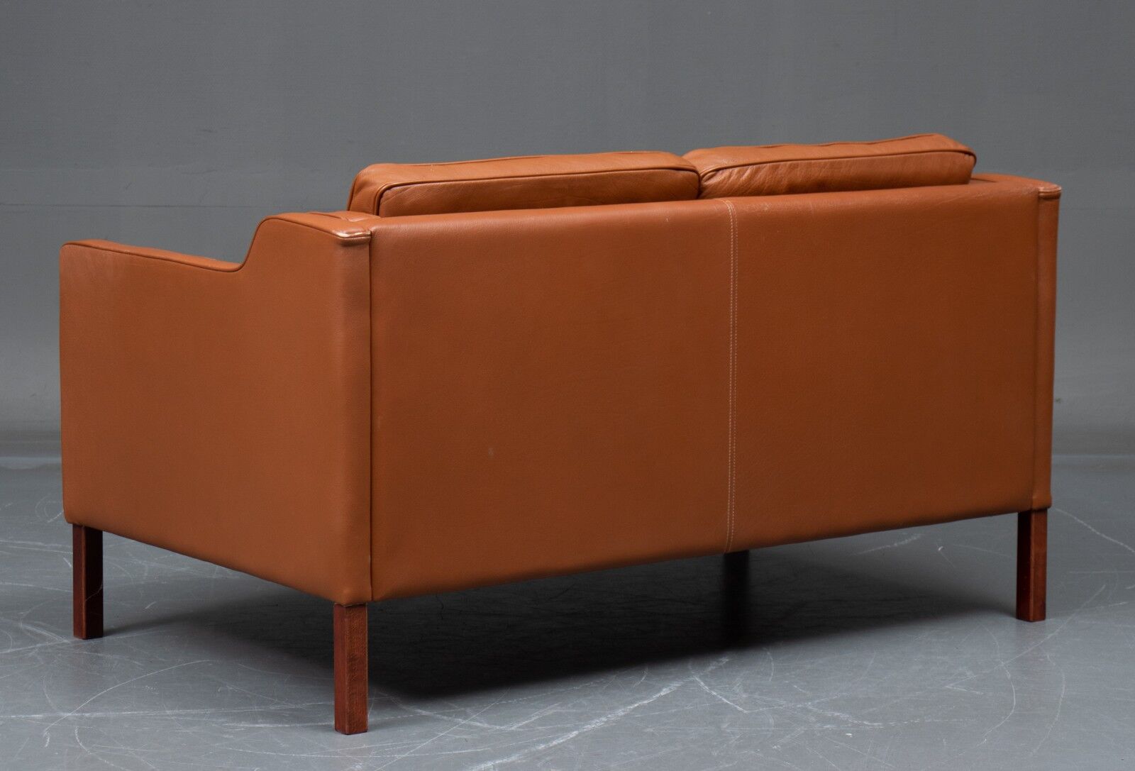 VINTAGE DANISH MID CENTURY STOUBY 2 PERSON SOFA IN COGNAC LEATHER