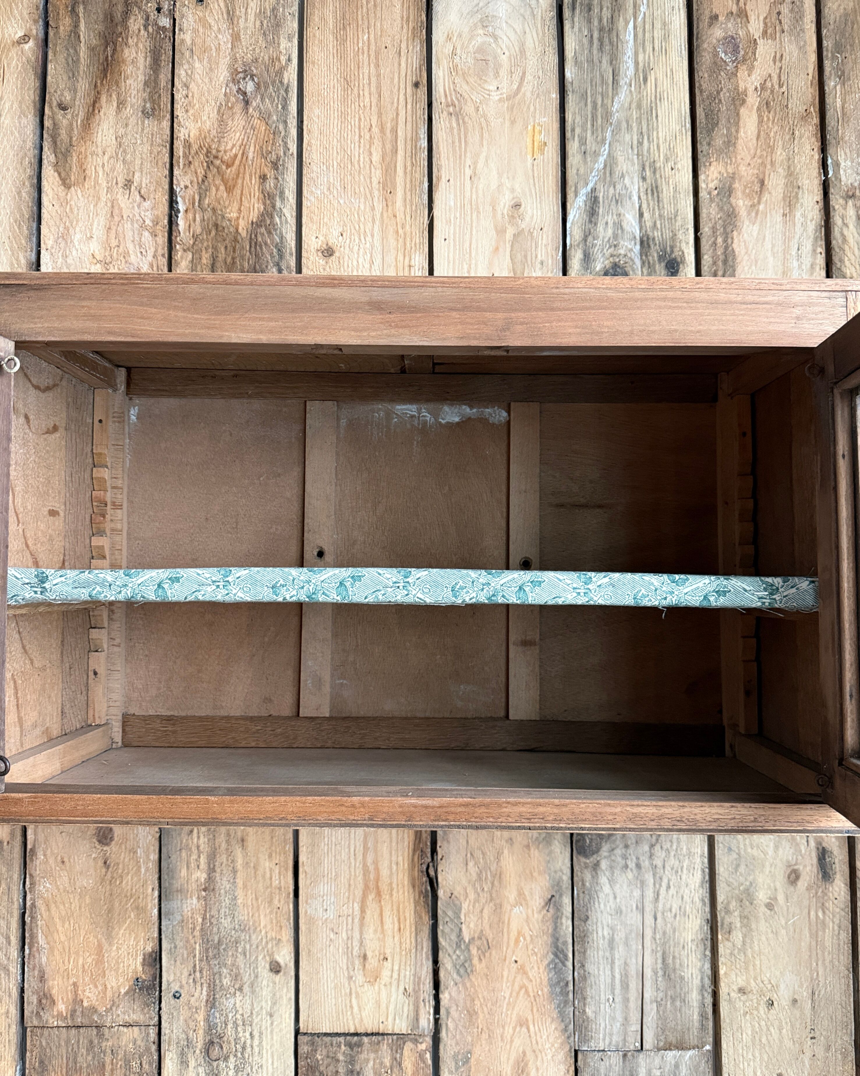 Small antique wall display cabinet in walnut.