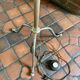 Vintage gold-plated tripod floor lamp