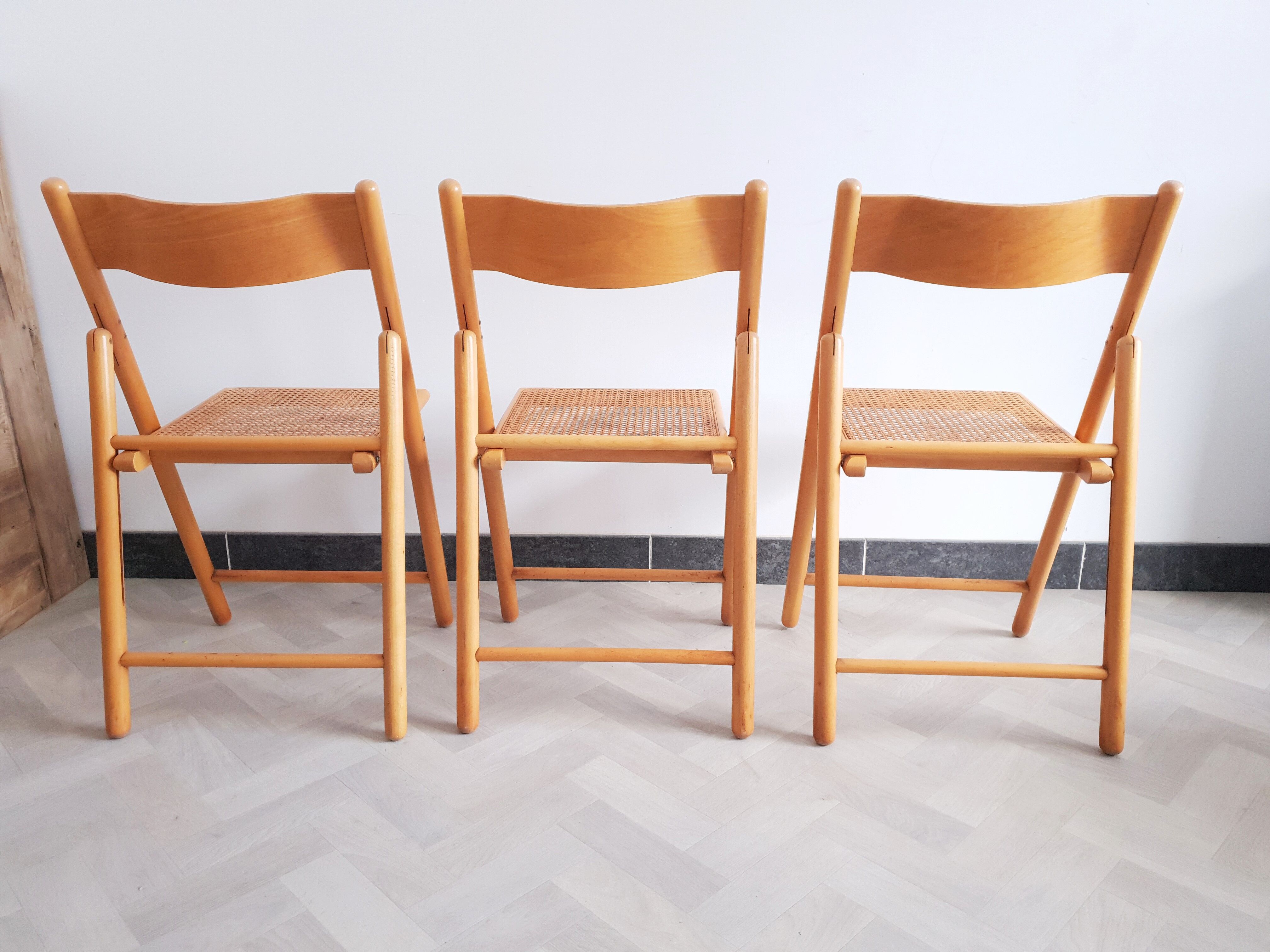Trio of cannate chairs