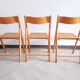 Trio of cannate chairs