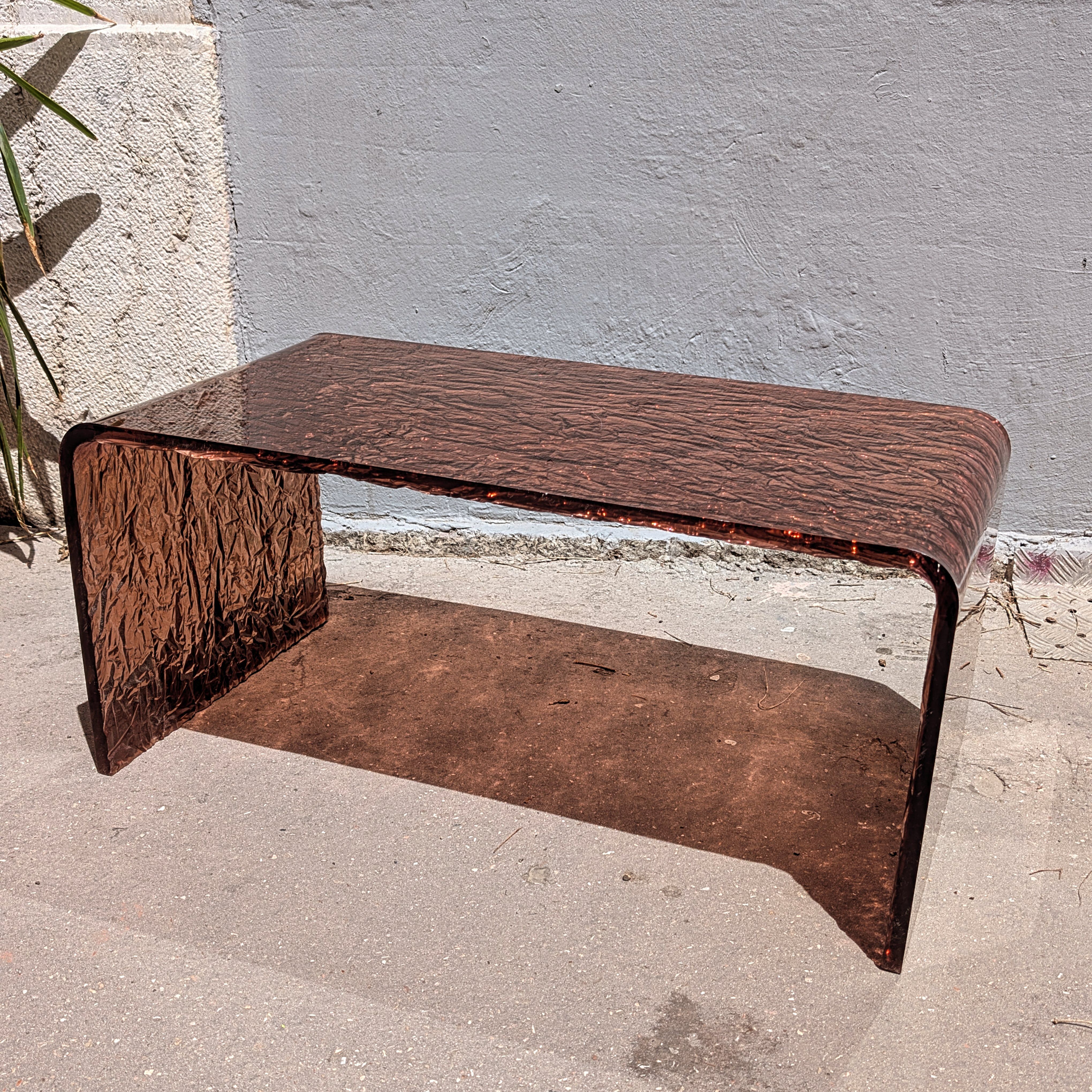 Smoked plexiglass coffee table