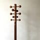 Modernist coat rack on a stand and rotating in solid pine, The Arcs 1970.