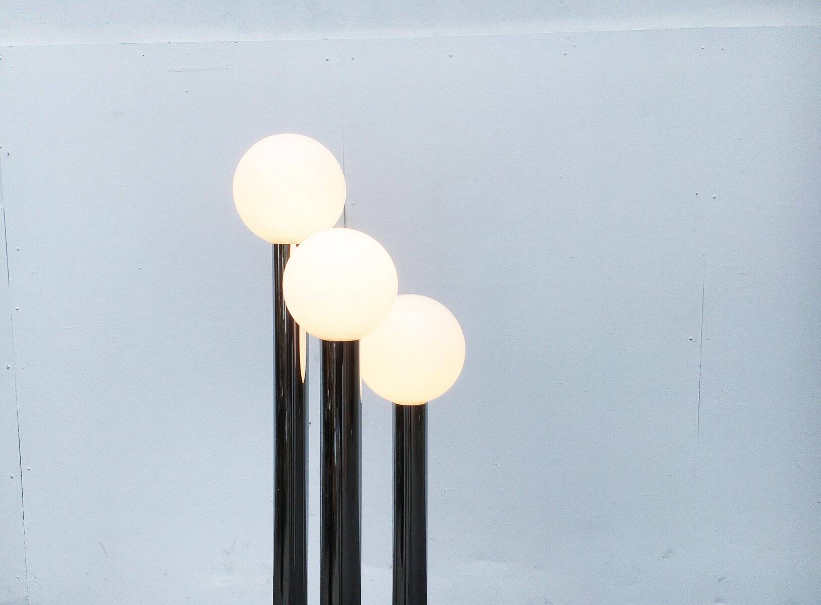 Vintage German floor lamp from the 1970s in glass and metal.