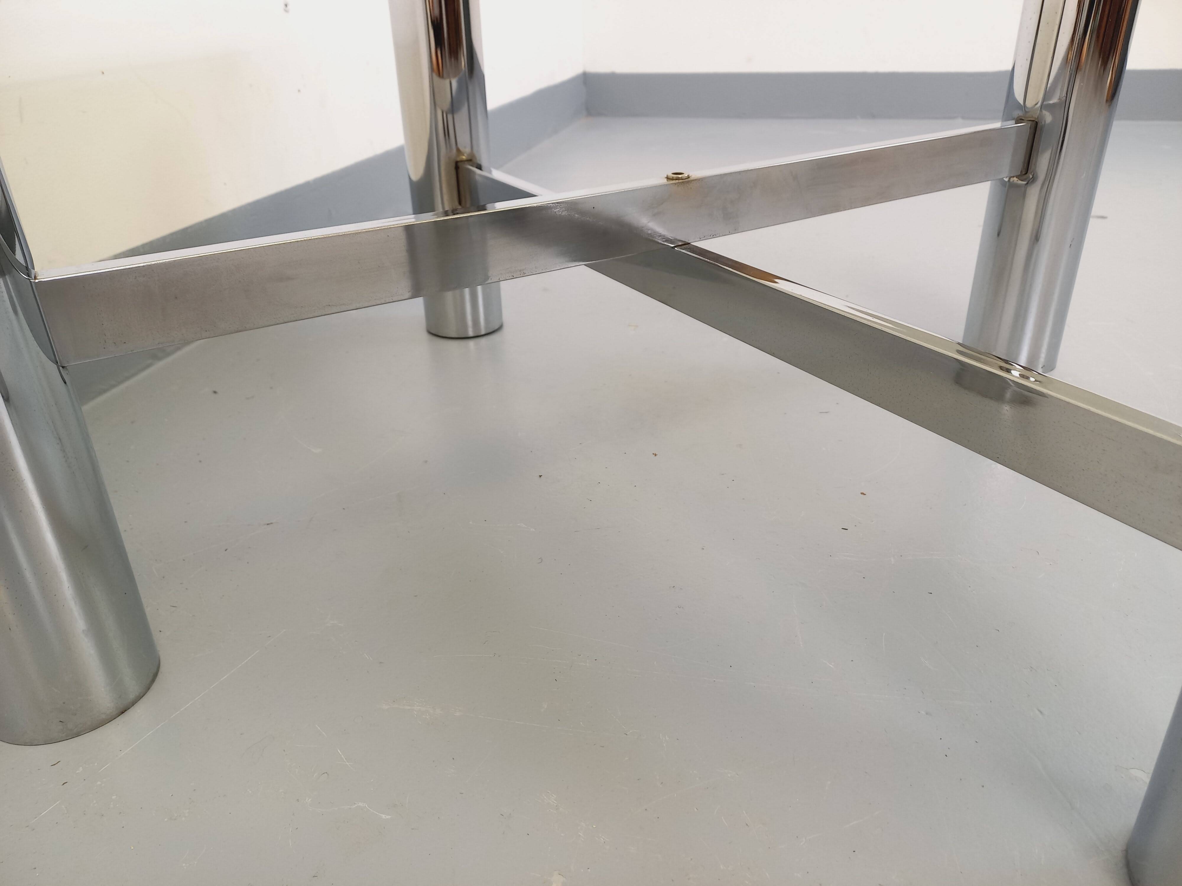 Square Italian vintage Space Age coffee table in smoked glass and metal.