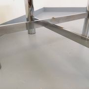 Square Italian vintage Space Age coffee table in smoked glass and metal.