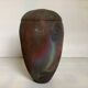 Asymmetrical vase by ceramicist Van Gompel
