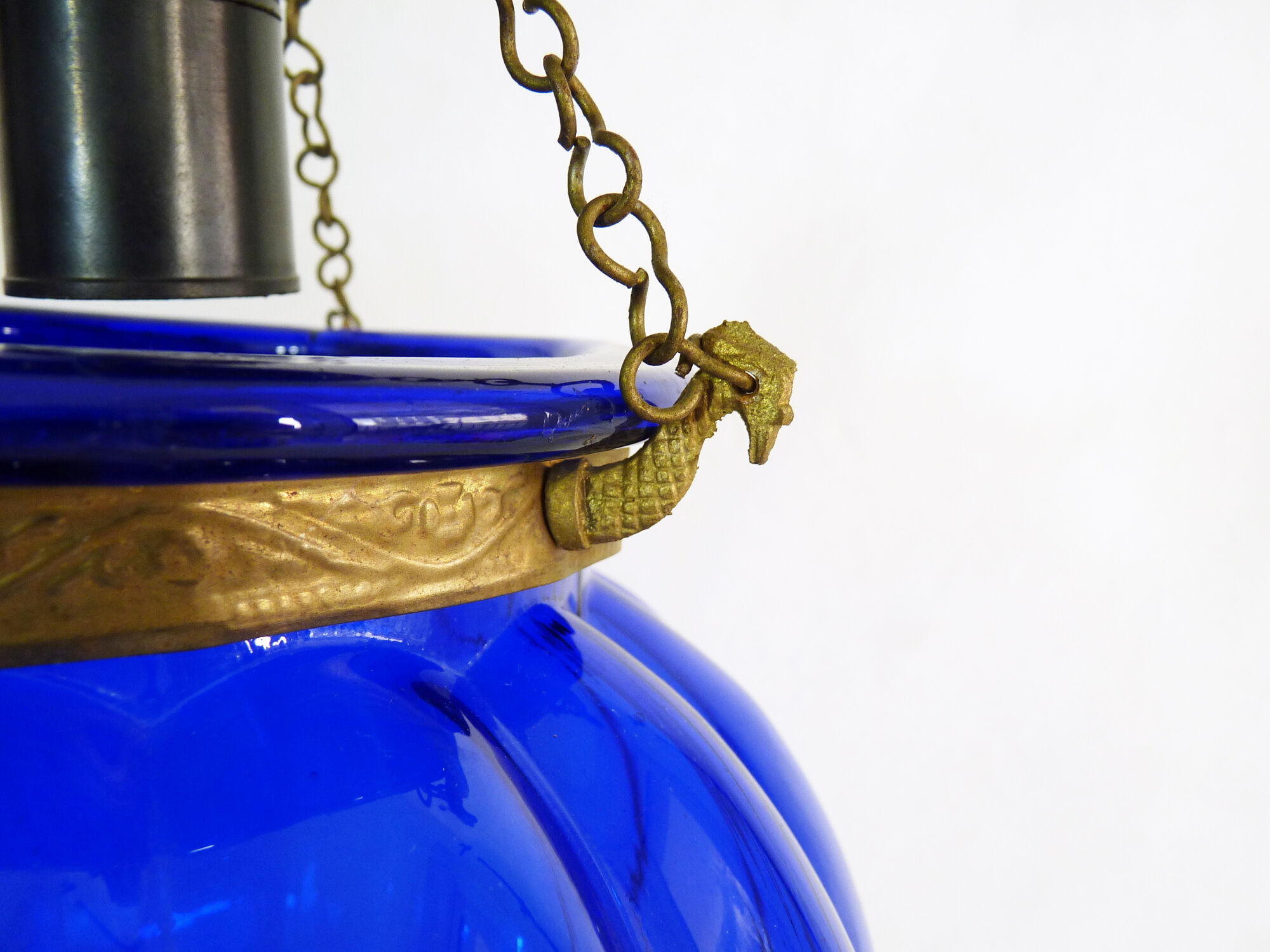 Suspension chandelier, oriental blue glass lantern and brass structure. Year 70-80