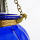 Suspension chandelier, oriental blue glass lantern and brass structure. Year 70-80