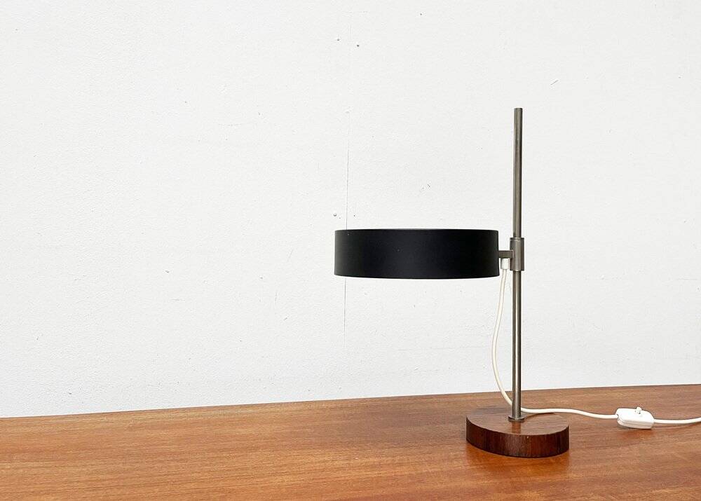 Mid-century minimalist table lamp with a teak veneer base, 1960s.