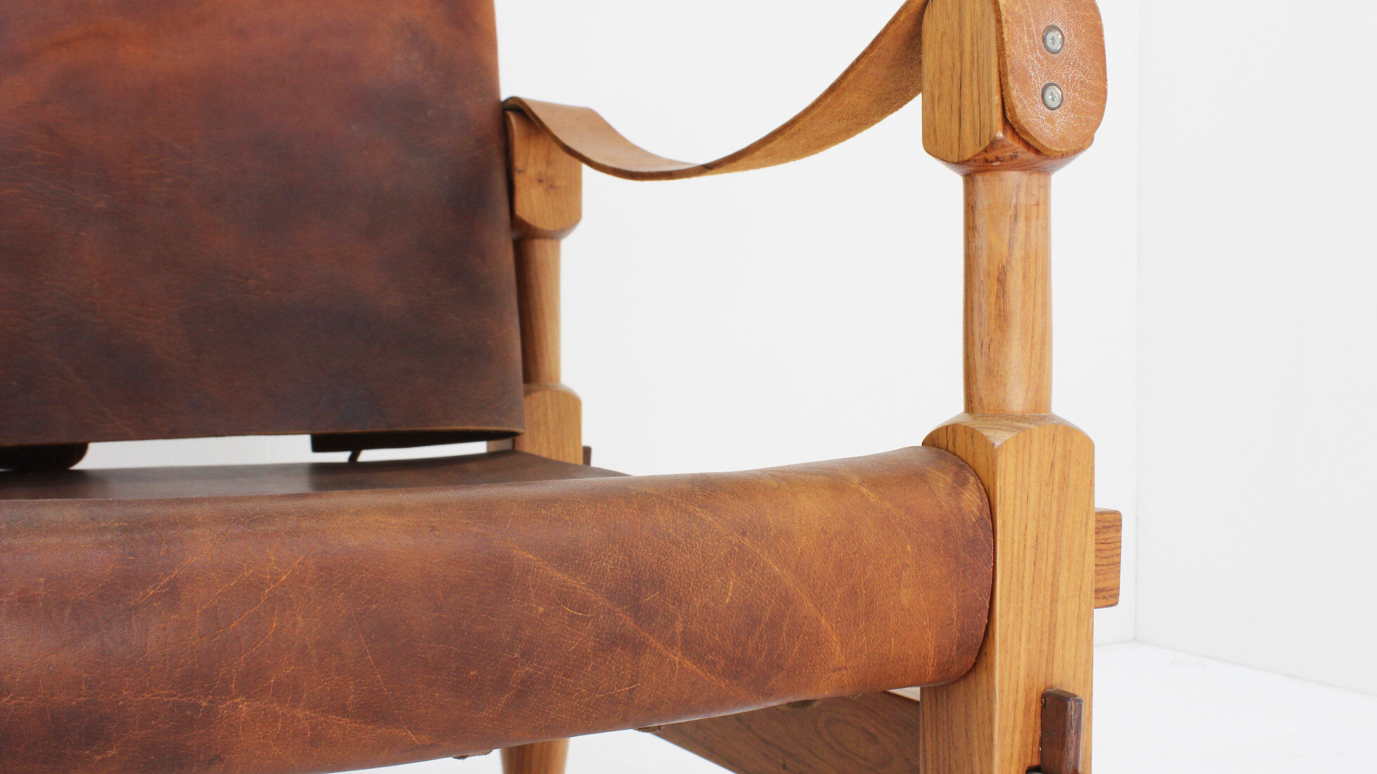 Vintage brutalist wood and cognac leather safari armchair, 1960s