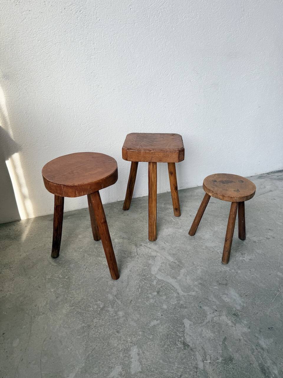 3 free-form oak tripod stools