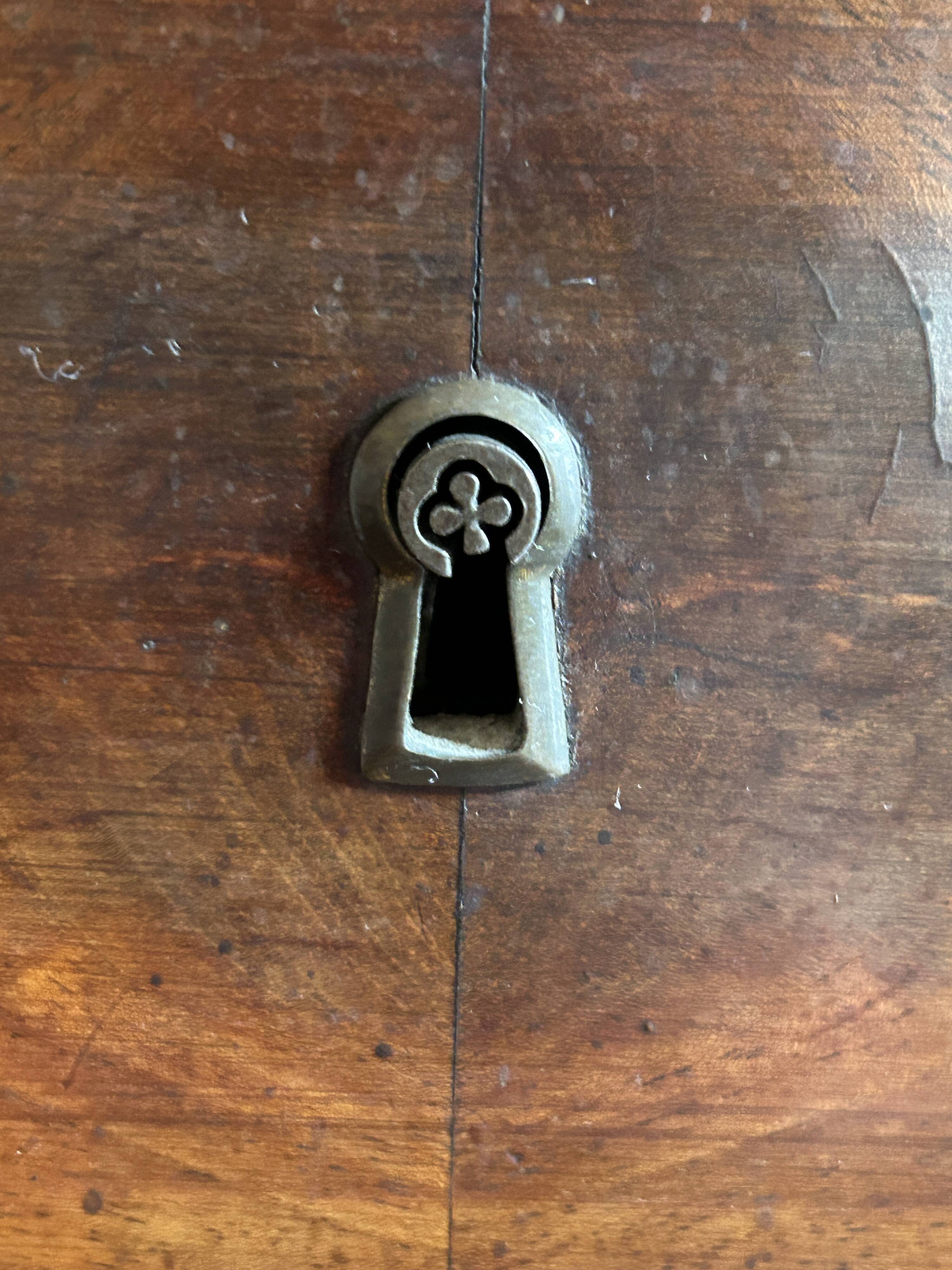 Mahogany and black marble chest of drawers, late 18th-early 19th century