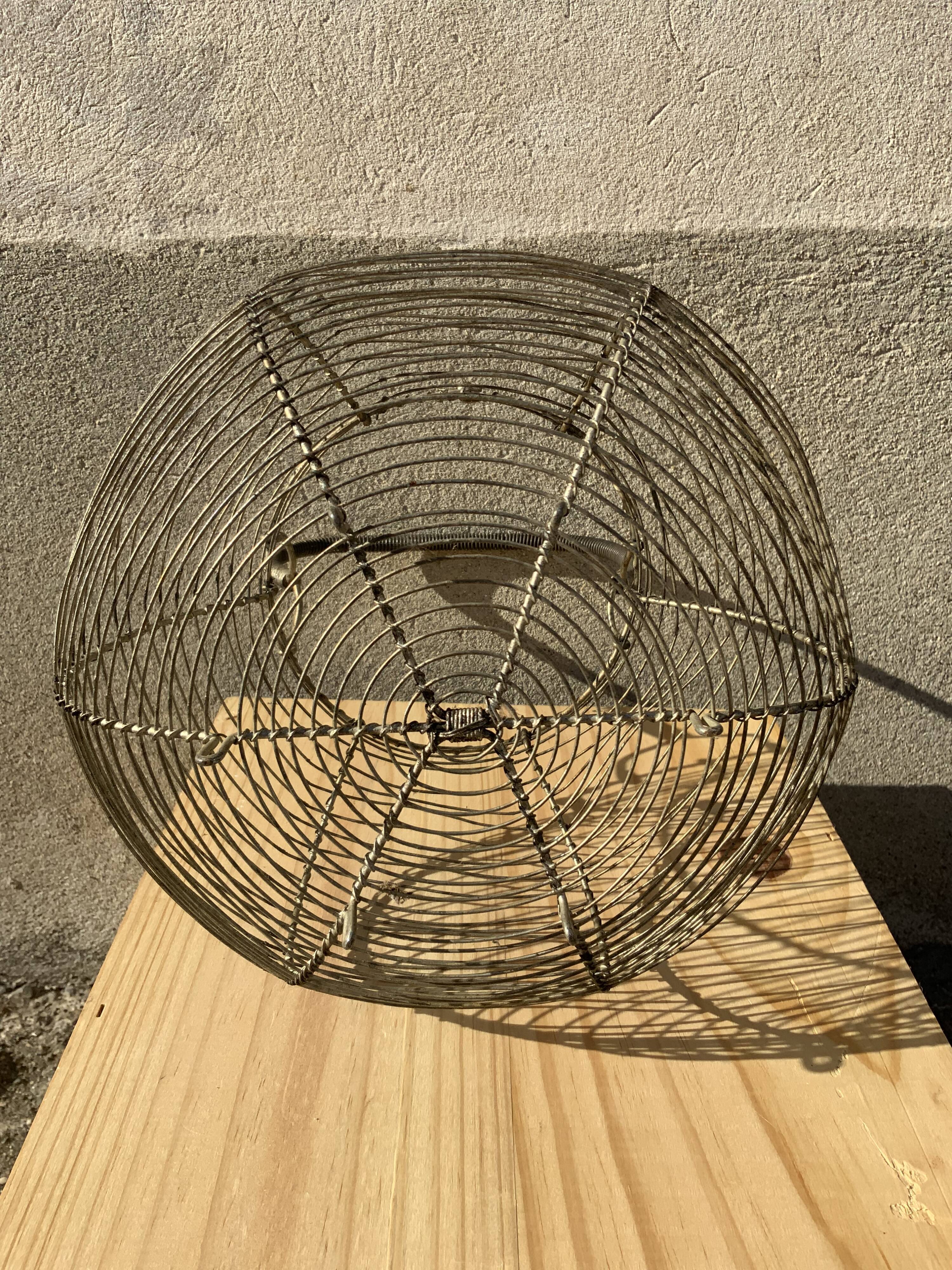 Vintage iron egg basket with hanse antique