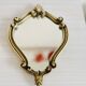Small antique mirror in baroque style – gold frame in bronze or brass.