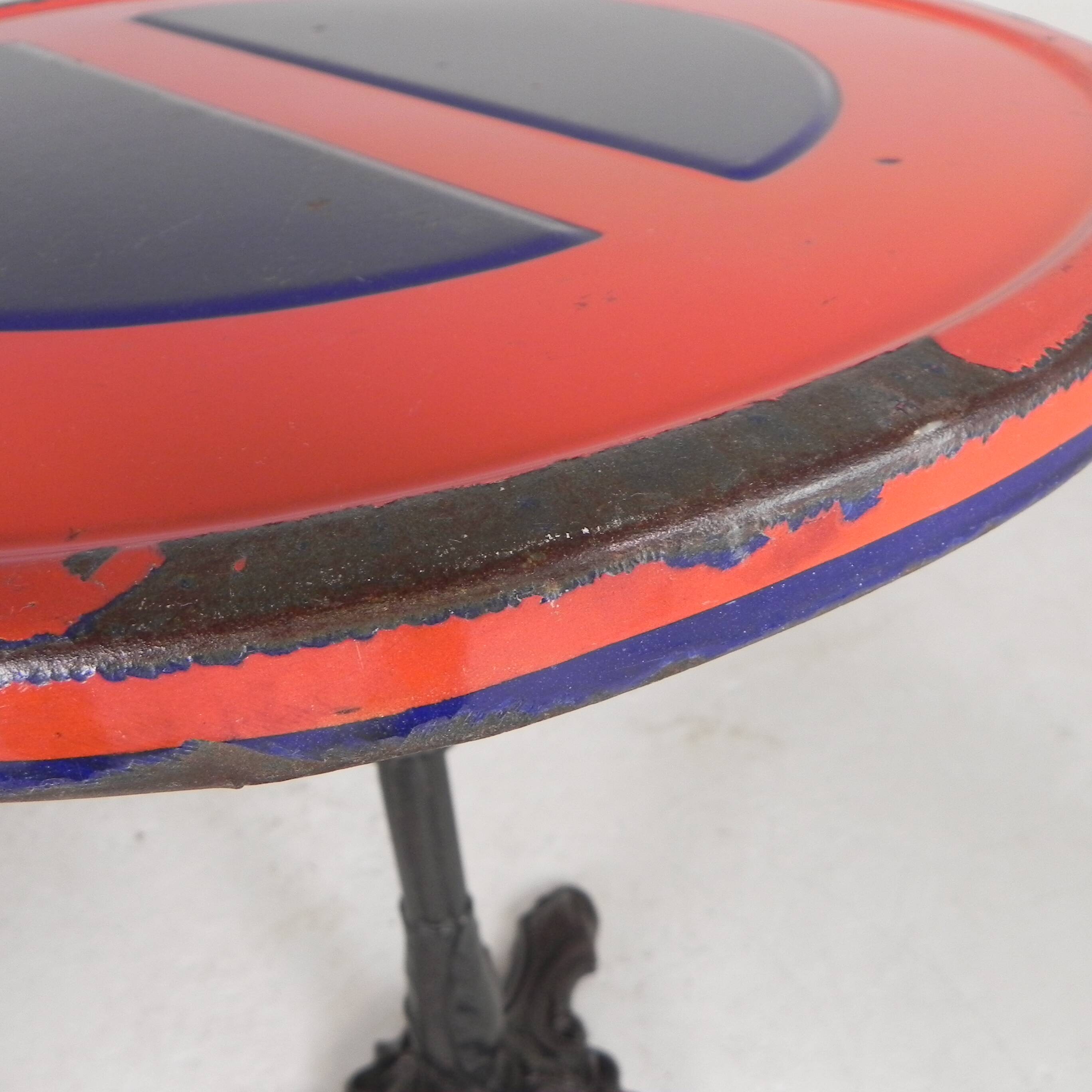 Bistro table with a cast iron base and a traffic sign as a tabletop, Paris 1920s.