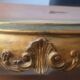 Shelf in wood and gold paint