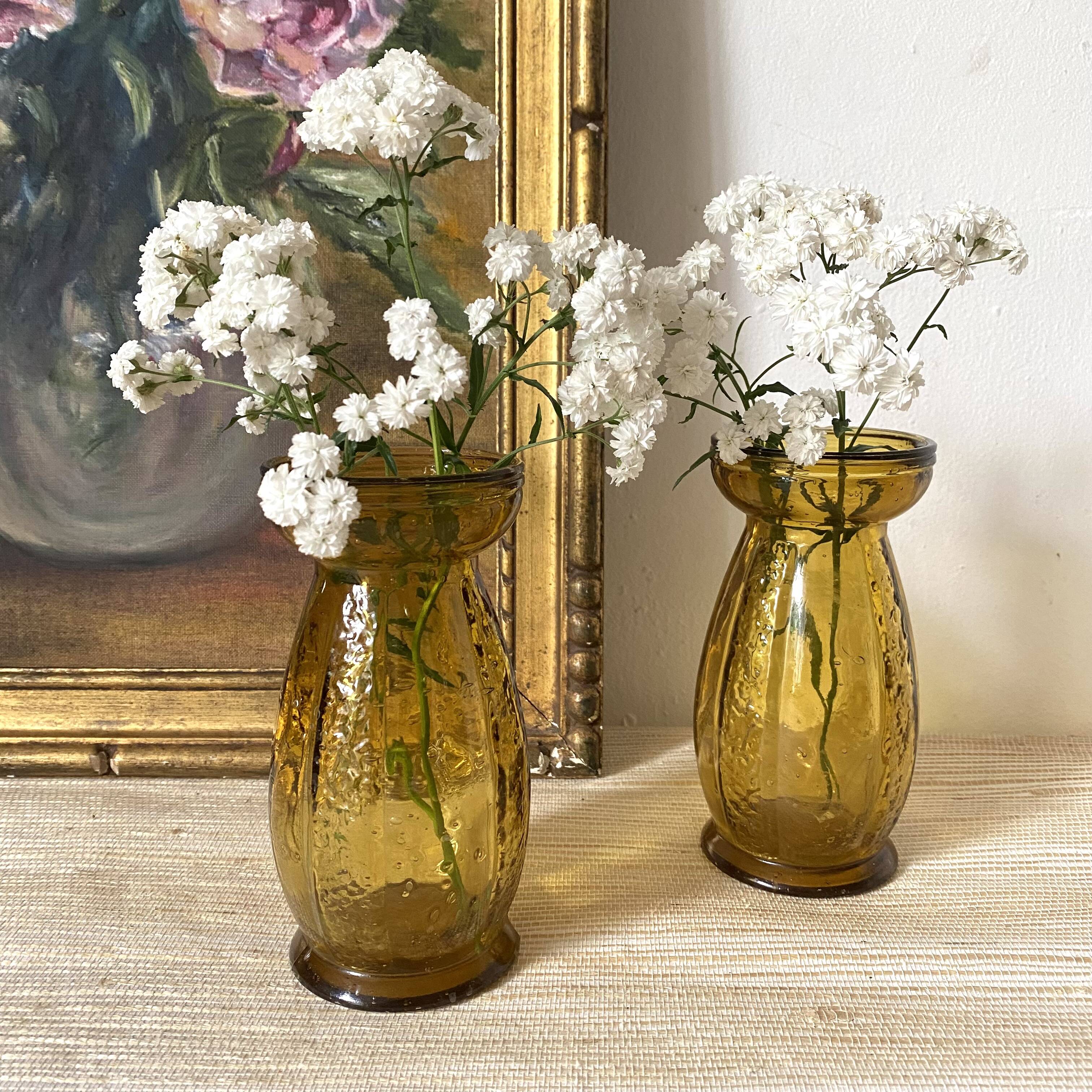 Paire de vases à jacinthe en verre ambré bullé